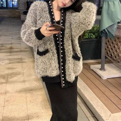Top grosso chique e na moda com casaco de malha em seda brilhante